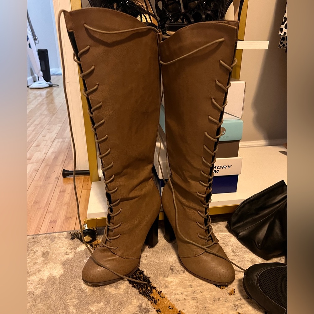 Knee high lace up faux leather boots